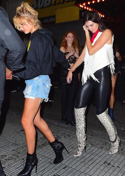 kendall jenner Her Travis Scott Listening Party Rebecca Minkoff Fringed Top, Helmut Lang Leather Pants, and Tom Ford Python Thigh High Boots