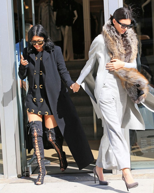 4 Kylie Jenner's New York City Haider Ackermann Wool Coat, Vintage Dress, and Tom Ford Thigh High Lace Up Boots