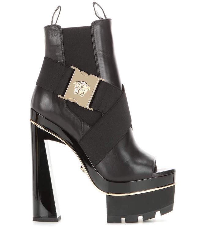 3-versace-aysmmetric-emblellished-strap-leather-boots