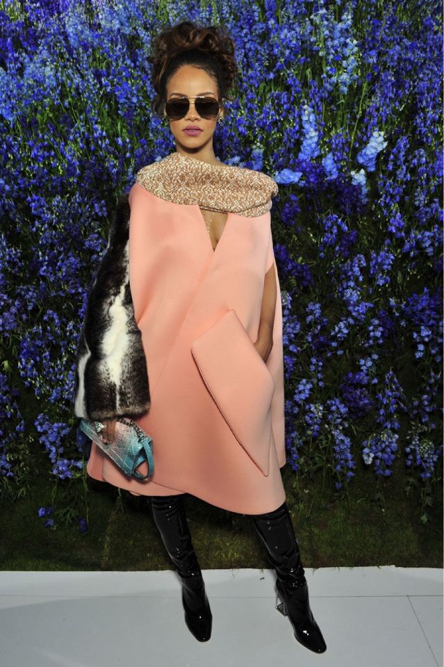 Face of Dior Rihanna struck a pose in black perspex heels.