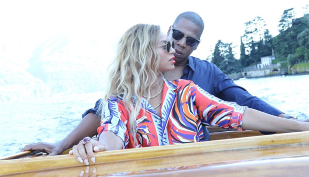 1 Beyonce Wears Emilio Pucci Fall 2016 Red, Purple, and Blue Printed Shirt and Pants While In Paris