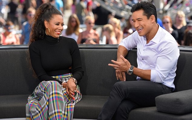 Mel B Cushnie et Ochs Turtleneck Cut Out Sweater and Marco de Vincenzo Plaid Flare Pants 2