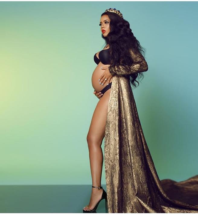 Angela-Simmons-Maternity-shoot-stello-gold-dress-vauje-royal-crown-1