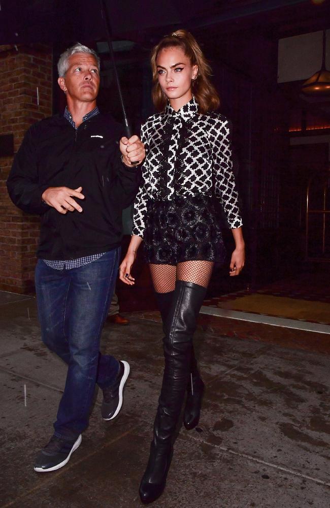 cara-delevingne-Emanuel Ungaro Spring 2016 Black and White Mesh Detail Long Sleeve Printed Shirt And Floral Motif Shorts