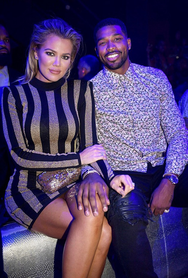2 Khloe Kardashian's Miami Balmain Gold and Black Striped Mini Dress