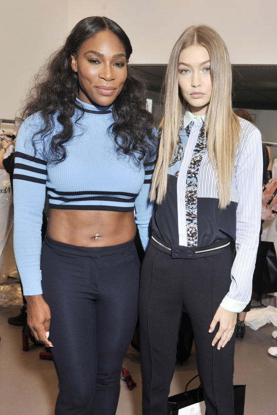 3 Serena Williams and Bella Hadid Wear Versace Black and Blue High Cropped Top to Versace Spring 2017 Show in Milan