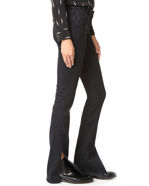 bella-hadid-aspen-3-x-1-w2-split-seamed-bell-jeans-3