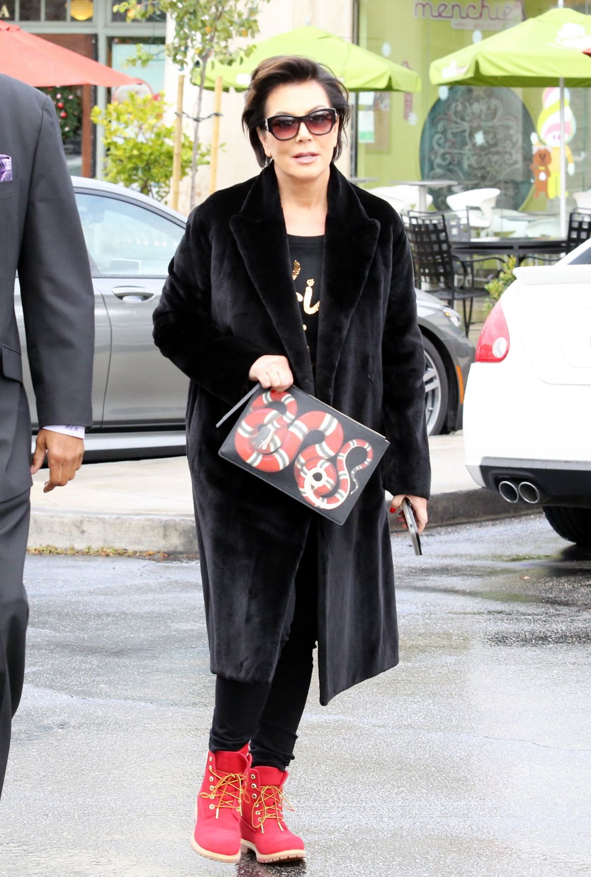 kris-jenner-gucci-sanke-print-leather-pouch-2