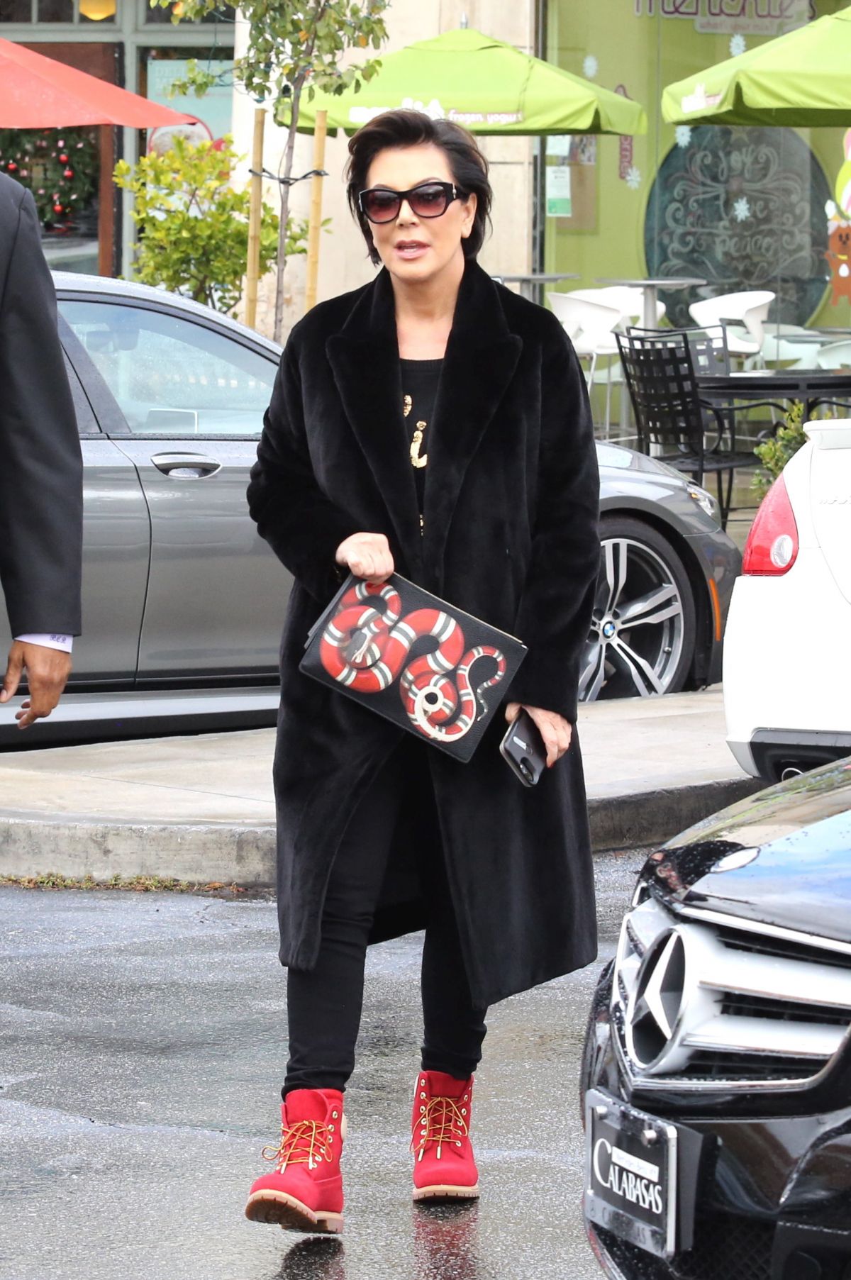 kris-jenner-gucci-sanke-print-leather-pouch-5