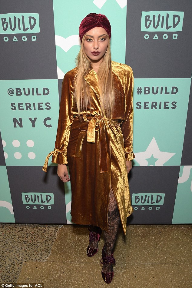 kat-graham-build-studio-opening-a-l-c-augusto-coat-1
