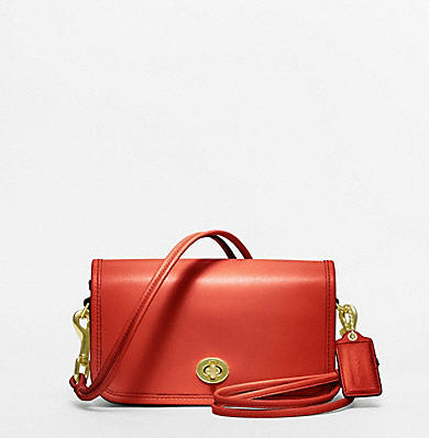 Get the Look: Ashley Madekwe’s Lucky FABB Zara Studded Top, Madewell Floral Pleated Skirt, Coach Leather Bag, and Zara High Heel Sandals