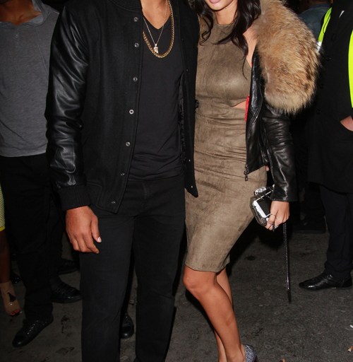Wardrobe Query: Draya Michele’s London La Belle Femme Fur Trimmed Jacket and Zenaba Nabi Cut Out Olive Green Suede Crop Top and Matching Skirt