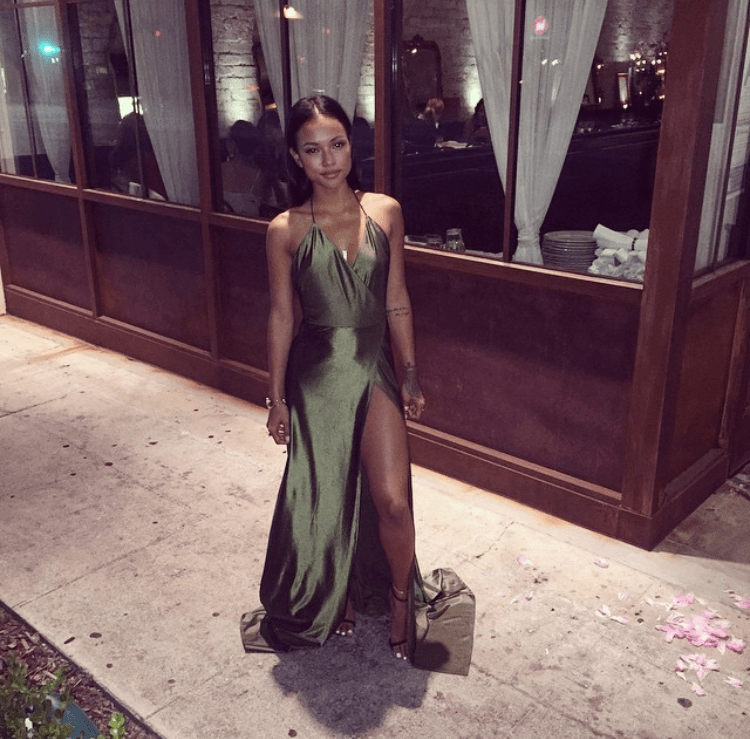 Splurge: Karrueche Tran’s Rap Up x Hennessy Event Just Enaj Femma LA Olive Green High Slit Evening Gown