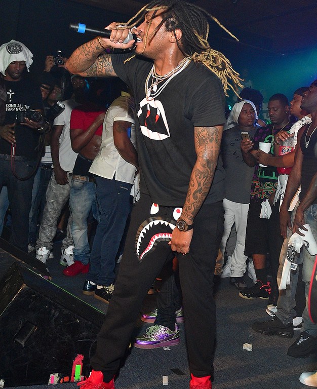 Men’s Fashion Flash: Future’s Atlanta Concert Saint Laurent Black Fang Print T-Shirt, Bape Shark Mouth Pants, and Red Jordan 11LAB4 Sneakers