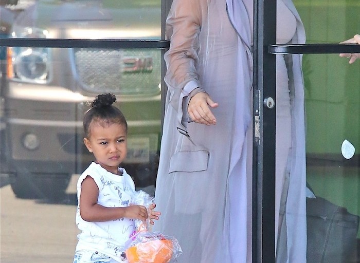 Hot! or Hmm…: Kim Kardashian’s Birthday Party Haider Ackermann Silk Trench, Azzedine Alaia Scalloped Circle Sandals, and Celine ZZ Top Tortoise Sunglasses