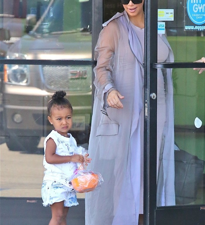 Hot! or Hmm…: Kim Kardashian’s Birthday Party Haider Ackermann Silk Trench, Azzedine Alaia Scalloped Circle Sandals, and Celine ZZ Top Tortoise Sunglasses