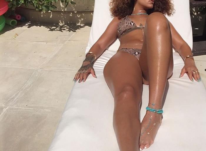 Steal: Rihanna’s Barbados Vacation Charlie by Matthew Zink Farrah Python Printed Halter Bikini