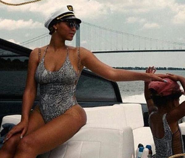 Wardrobe Query: Beyonce’s Yacht Acacia Swimwear Snake Print One Piece Side Cut Out Swimsuit