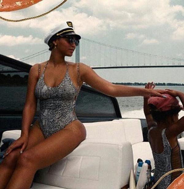 Wardrobe Query: Beyonce’s Yacht Acacia Swimwear Snake Print One Piece Side Cut Out Swimsuit