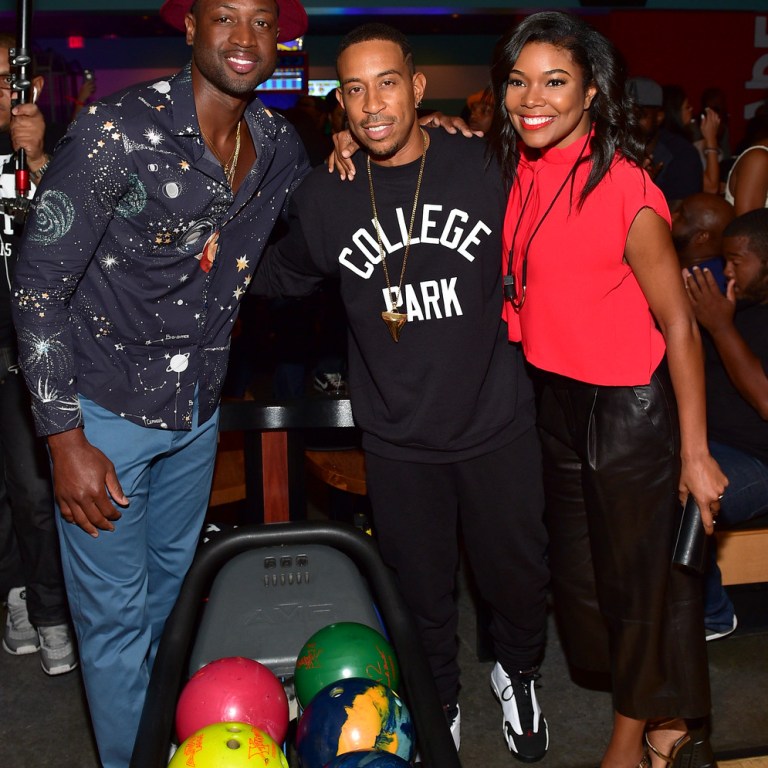Men’s Fashion Flash: Dwyane Wade’s Ludacris Weekend Bowling Tournament Valentino Cosmo Planet Print Shirt
