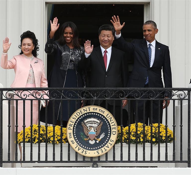 First Lady Michelle Obama Wears 3.1 Phillip Lim Midnight and Metallic Floral Dress and Coat at the State Arrival Ceremony of Chinese President Xi Jinping and Madame Peng Liyuan