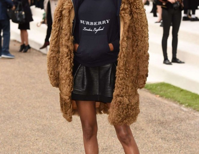 Splurge: Jourdan Dunn’s Burberry Prorsum Spring 2016 Show Burberry Prorsum Shearling Coat, Burberry Brit Leather Taped Suede Skirt, and Burberry Overfield Open Toe Booties
