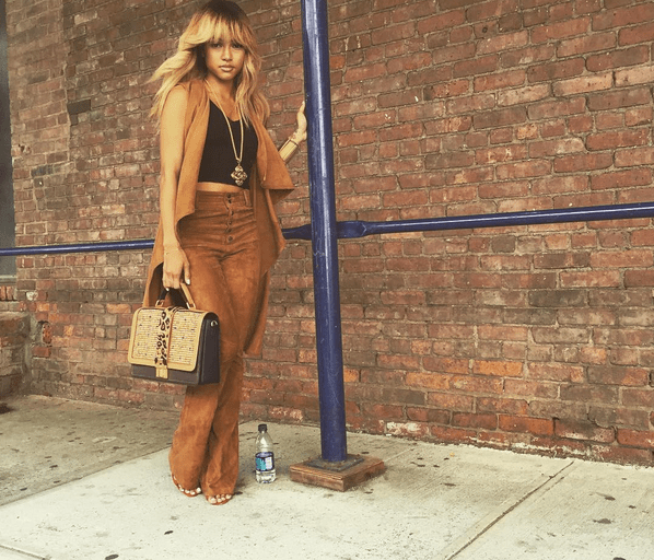 Splurge: Karrueche Tran’s New York Fashion Week La Marque Brown Suede Elem Vest and the High Waisted Pants