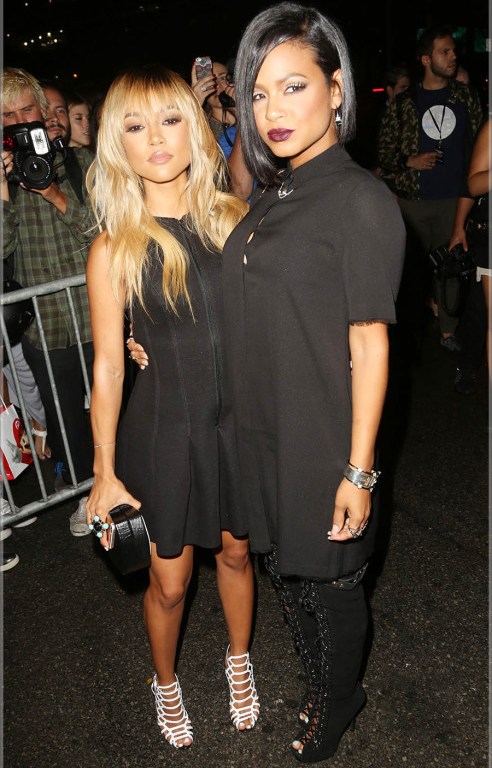 Get the Look: Karrueche Tran’s New York Fashion Week T by Alexander Wang Scuba Neoprene Sleeveless Dress, Gelareh Mizrahi Wu Tang Crossbody Bag, and Schutz Juliana Sandals
