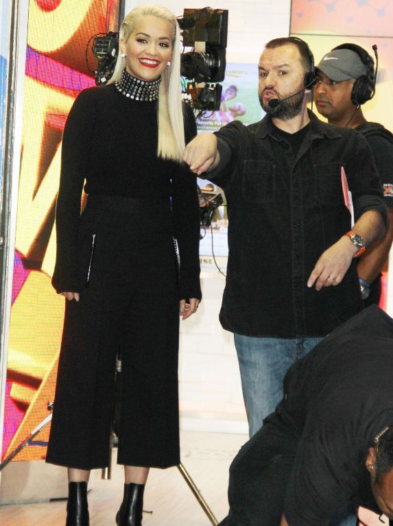 Splurge: Rita Ora’s Good Morning America Tom Ford Anoushka Cat Eye Sunglasses, Alexander Wang Studded Silk and Cashmere Sweater, and Cottonwool High Waist Pants