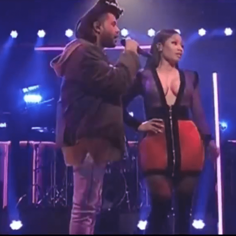 Splurge: Nicki Minaj’s The Weeknd Saturday Night Live Performance Balmain Colorblock Crochet Purple and Orange Zip Front Dress and Alexander McQueen Zip Front Boots