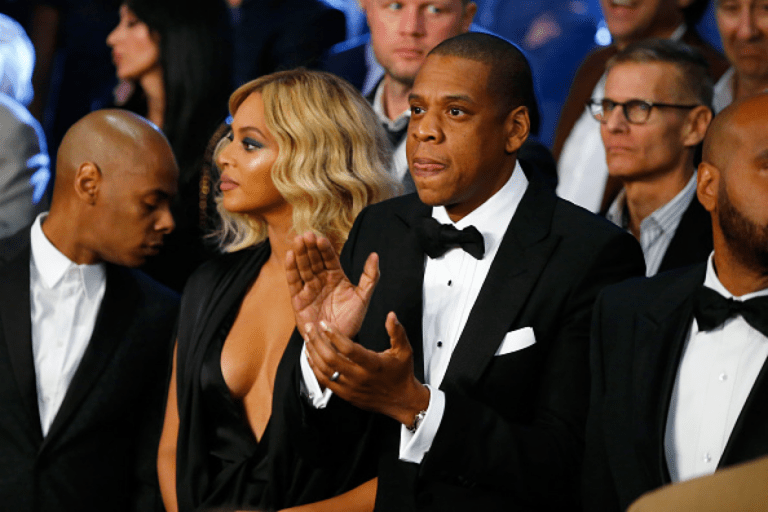 Hot! or Hmm…: Beyonce’s Canelo vs. Cotto Vegas Fight Michael Costello Nirvana Collection Draped Black Dress