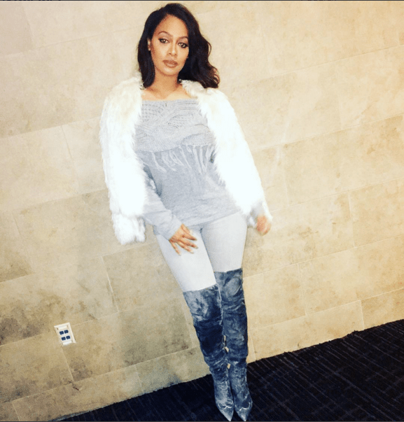 Splurge: Lala Anthony’s Instagram Intermix Exclusive Fringed Gray Off the Shoulder Sweater