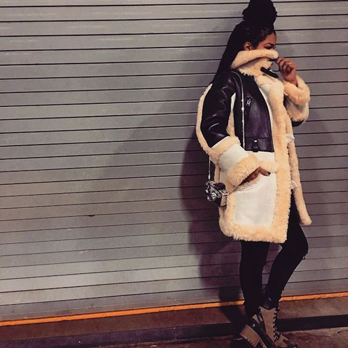 Get The Look: Teyana Taylor’s Instagram Coach Shearling And Leather Biker Coat, Louis Vuitton Monogram Canvas Desert Boots And Judith Leiber Mini Camera Clutch Bag