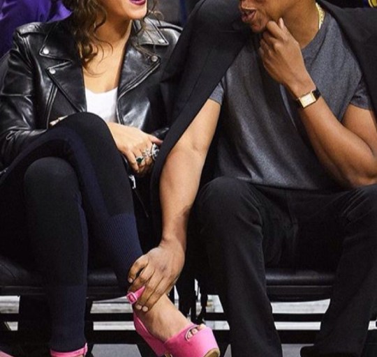 Get The Look: Beyonce’s Warriors vs. Clippers Game Dior Sunglasses, Saint Laurent Biker Jacket, Rag & Bone Kristin Colorblock Leggings, Loewe Pink Puzzle Handbag, and Custom Givenchy Pink Platform Sandals