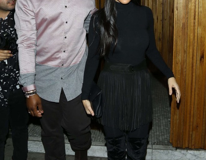 Splurge: Kourtney Kardashian’s The Nice Guy Wolford Black Luxe Pullover Turtleneck, Azzedine Alaia Black Fringed Suede Belt, and Aquazzura Black Velvet Over The Knee Boots