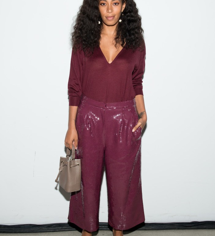 Splurge: Solange Knowles’s Tibi Fall 2016 Show Tibi Plum Featherweight Cashmere V-Neck Pullover, All Over Sequin Nerd Pants, and Furla Mini Stacy Leather Bucket Bag