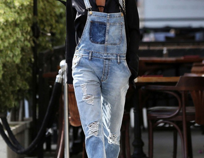 Look for Less: Jasmine Tookes’s Il Pastaio Ports 1961 Black Silk Lace Up Blouse, Don’t Cry Denim Overalls, and Le Silla Lace Up Leopard Booties