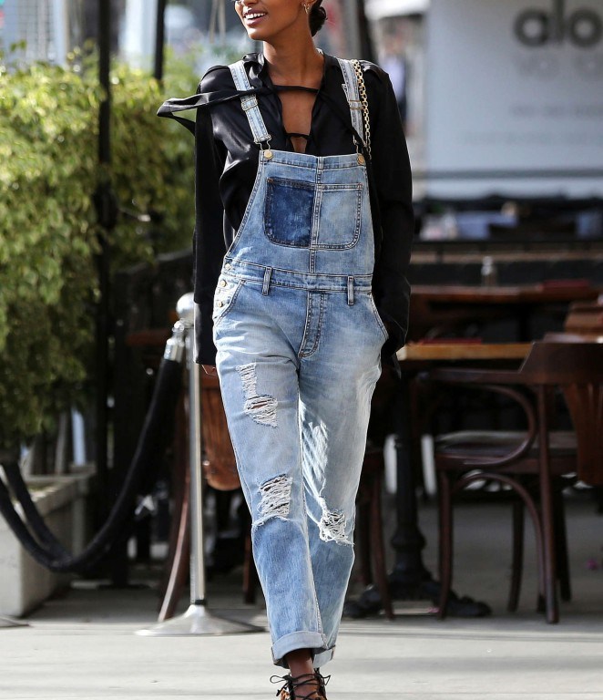Look for Less: Jasmine Tookes’s Il Pastaio Ports 1961 Black Silk Lace Up Blouse, Don’t Cry Denim Overalls, and Le Silla Lace Up Leopard Booties