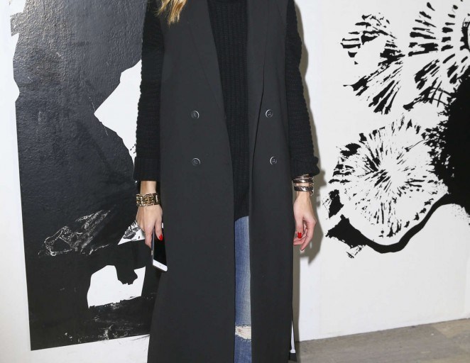 Splurge: Olivia Palermo’s Paul & Joe Fashion Show Topshop Black Maxi Duster Coat, Iris Von Arnim Black Cashmere Sweater, and Saint Laurent Black Suede Fringe High Heel Booties