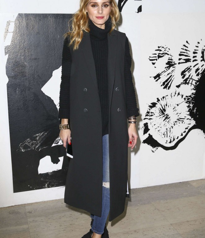Splurge: Olivia Palermo’s Paul & Joe Fashion Show Topshop Black Maxi Duster Coat, Iris Von Arnim Black Cashmere Sweater, and Saint Laurent Black Suede Fringe High Heel Booties