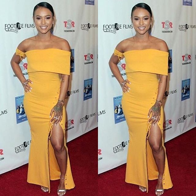 Splurge: Karrueche Tran’s A Weekend With The Family Los Angeles Premiere Zeena Zaki Golden Off-the-Shoulder Dress with Lace-Up Detailing
