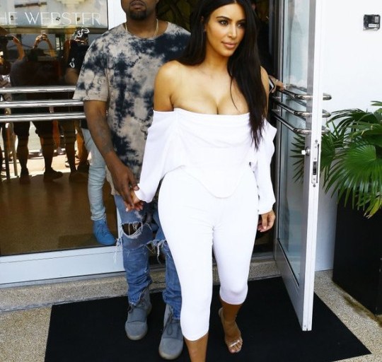 Splurge: Kim Kardashian’s Miami Givenchy White Off-the-Shoulder Top and Capri Pants