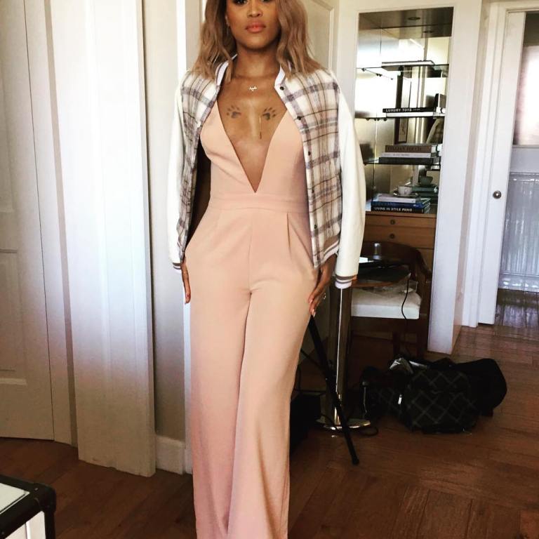 Splurge: Eve’s Instagram  Chloé Checked Bomber Jacket and House of CB Blush Marwa Deep V Wide Leg Jumpsuit