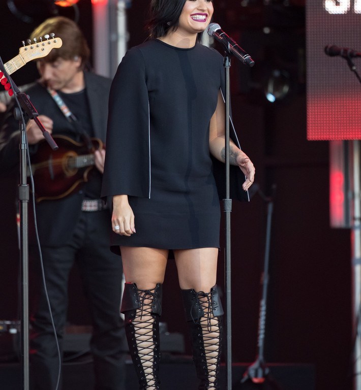 Splurge: Demi Lovato’s Jimmy Kimmel Live Givenchy Black Stretch Crepe Mini Dress and Nasty Gal Black Clarissa Over The Knee Lace Up Boots