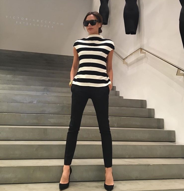 Splurge: Victoria Beckham’s The Art Club Victoria Beckham Striped Knitted Top, Black Tuxedo Trousers and Gucci ‘Adina’ Horsebit Detailed Suede Pumps