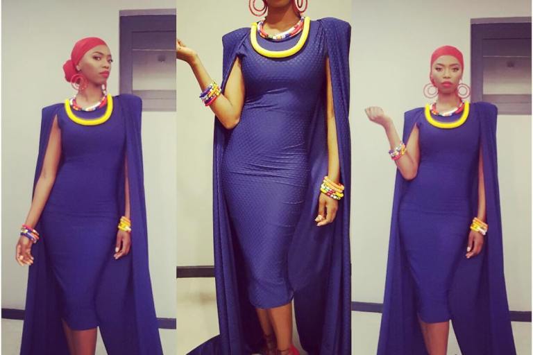 Hot! or Hmm… Lira’s Instagram Scalo Navy Cape Midi Dress, Piece Red Hoop Earrings, and NtoZinhle Accessorize Jewelry