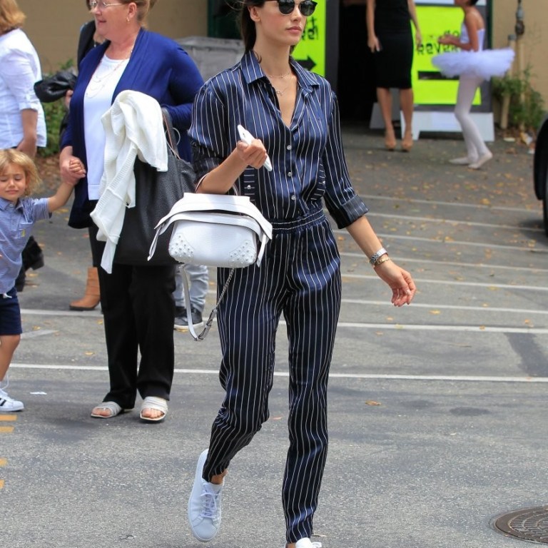 Splurge: Alessandra Ambrosio’s Los Angeles Shopping Linda Farrow 421 Sunglasses, Anthony Vaccarello Pinstripe Jumpsuit, and Tod’s Mini Wave Bag