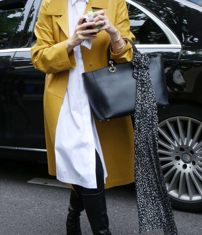 Splurge: Celine Dion’s The Royal Monceau Hotel Jil Sander Yellow Leather Coat and Gianvito Rossi Black Leather Vixen Boots