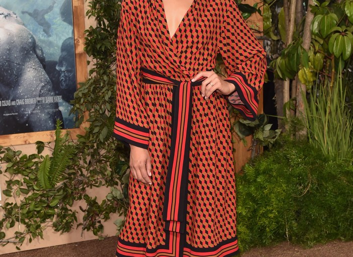 Splurge: Cush Jumbo’s <em>The Legend of Tarzan</em> Hollywood Premiere Michael Kors Collection Coral, Black, and Caramel Hexagon Print Silk Wrap Dress