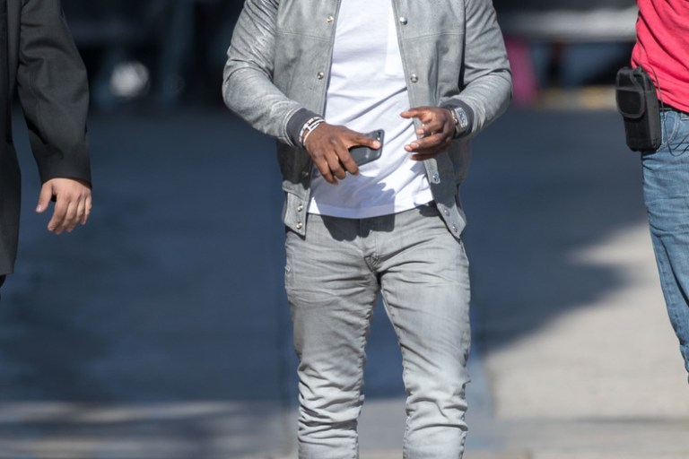 Men’s Fashion Flash: Kevin Hart’s Jimmy Kimmel Live John Elliott Swarm Stadium Jacket and Saint Laurent Red Leather Low Top Sneakers